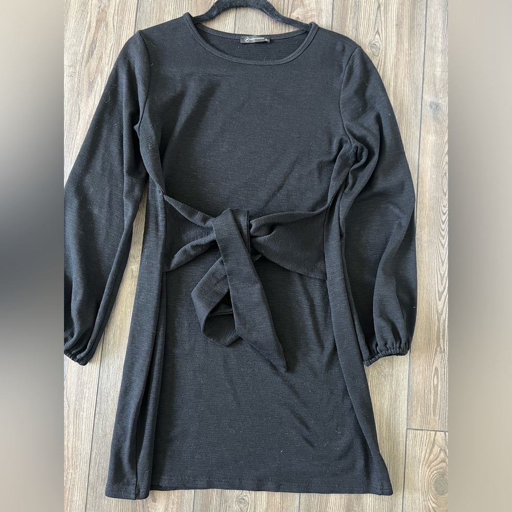 Black figure flattering belted dress